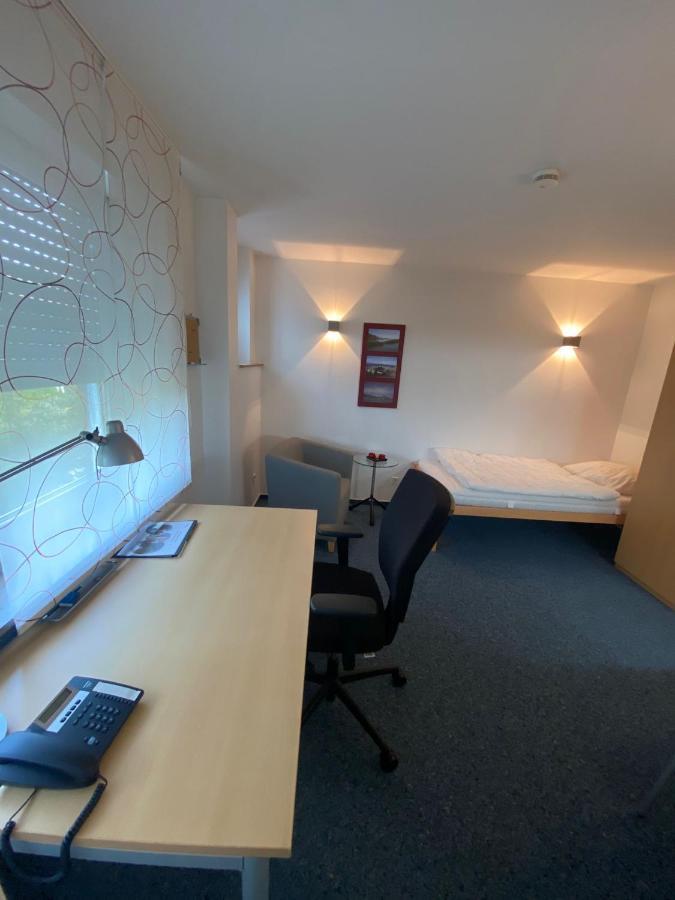 Awm Korntal Aparthotel Bagian luar foto