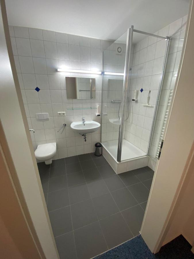 Awm Korntal Aparthotel Bagian luar foto